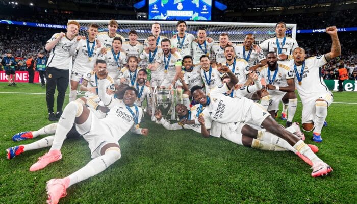 Vini dan Carvajal Antar Madrid Boyong Trofi UCL ke-15