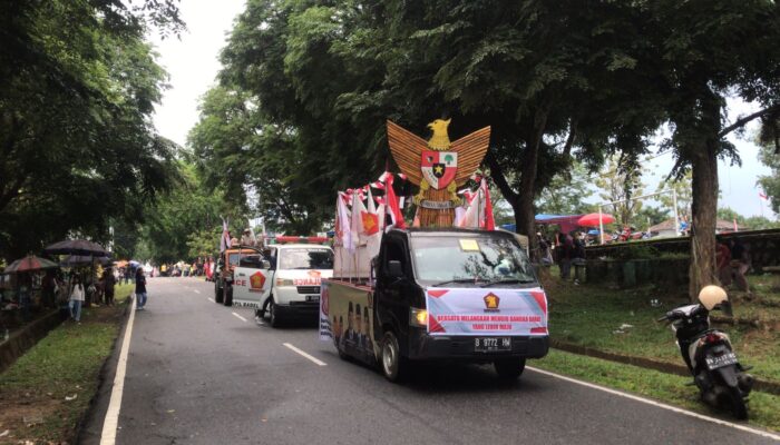DPC Babar Gerindra Terjunkan 2 Mobil Hias dan Salurkan Beras Gratis di Karnaval 2025