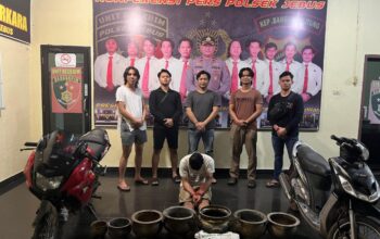 Tersangka AG diamankan polisi. Foto: Ist