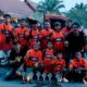 Bos Orange Racing Team merayakan kemenangan. Foto: Puji S