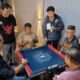 Orado Bangka Barat edukasi Permainan Domino. Foto: Rizki Ramadhani.